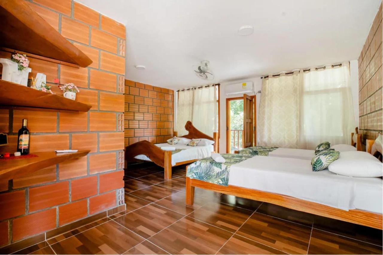 Arca Tayrona Restaurant & Hostal Los Naranjos Exteriör bild